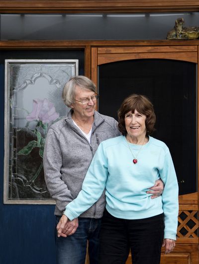 Herb and Ruth Beck pose for a photo in 2016 on the front porch of their home in Spokane.  (Tyler Tjomsland/The Spokesman-Review)