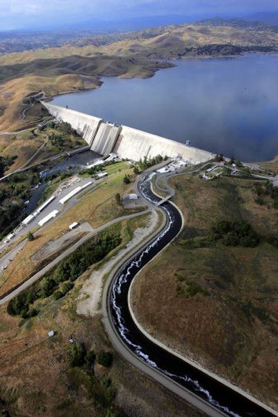 
Friant Dam forms Millerton Lake, Calif.,  is seen in 2005.  Water dammed here for nearly 60 years may be returned to 60 miles of the dried-up San Joaquin River bed by 2009 under a settlement. 
 (File Associated Press / The Spokesman-Review)