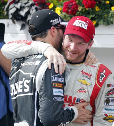 Jimmie Johnson, left, congratulates race winner Dale Earnhardt Jr. (Associated Press)