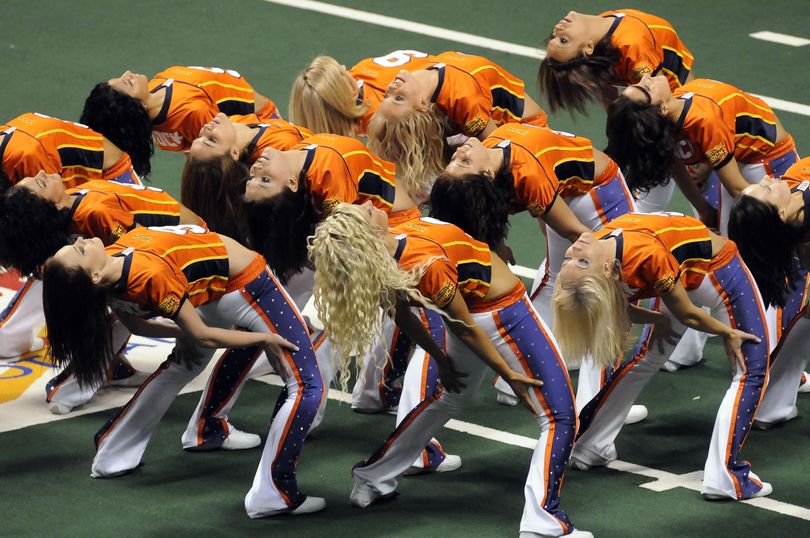 Spokane Shock cheerleaders roll out a new routine for the fans during a timeout May 2, 2009. (Dan Pelle / The Spokesman-Review)