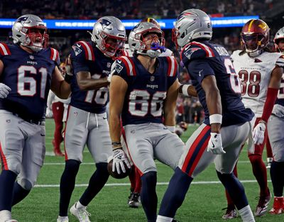 New England wide receiver Efton Chism III (86) celebrates his TD during the Patriots' 48-14 victory over the Commanders on Friday night in Foxboro, Mass.   (Tribune News Service)