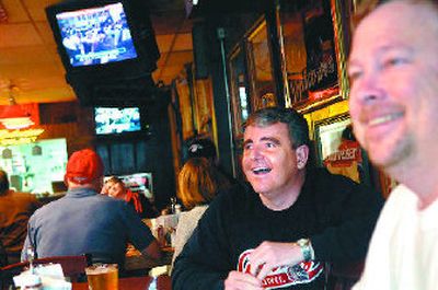 
 Spokane residents and Gonzaga fans Michael Hanson, left, and Larry Medin  watch the NCAA selection show at Jack and Dan's Tavern in Spokane. 
 (Holly Pickett / The Spokesman-Review)