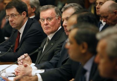 Bank of America  CEO Kenneth Lewis, center, with Bank of New York Mellon CEO  Robert Kelly, left, and other top bankers  testify before the House Financial Services Committee. (Associated Press / The Spokesman-Review)