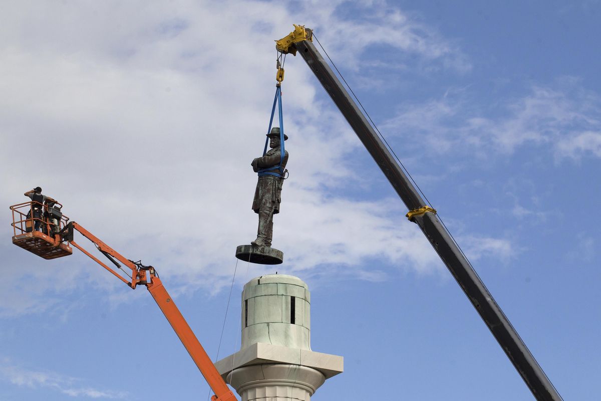 A statue of Confederate Gen. Robert E. Lee is removed from Lee Circle on Friday, May 19, 2017, in New Orleans. Lee’s was the last of four monuments to Confederate-era figures to be removed under a 2015 City Council vote on a proposal by Mayor Mitch Landrieu. (Scott Threlkeld / Associated Press)