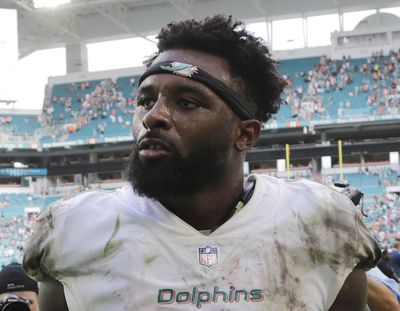 In this Oct. 22, 2017, file photo, Miami Dolphins wide receiver Jarvis Landry leaves the field after an NFL football game against the New York Jets, in Miami Gardens, Fla. A person familiar with the situation says Miami Dolphins receiver Jarvis Landry has signed his $16 million, one-year franchise tag, easing the path to a potential trade. The person confirmed the signing to The Associated Press on condition of anonymity Thursday, March 8, 2018, because the Dolphins hadn’t announced the move. (Lynne Sladky / Associated Press)