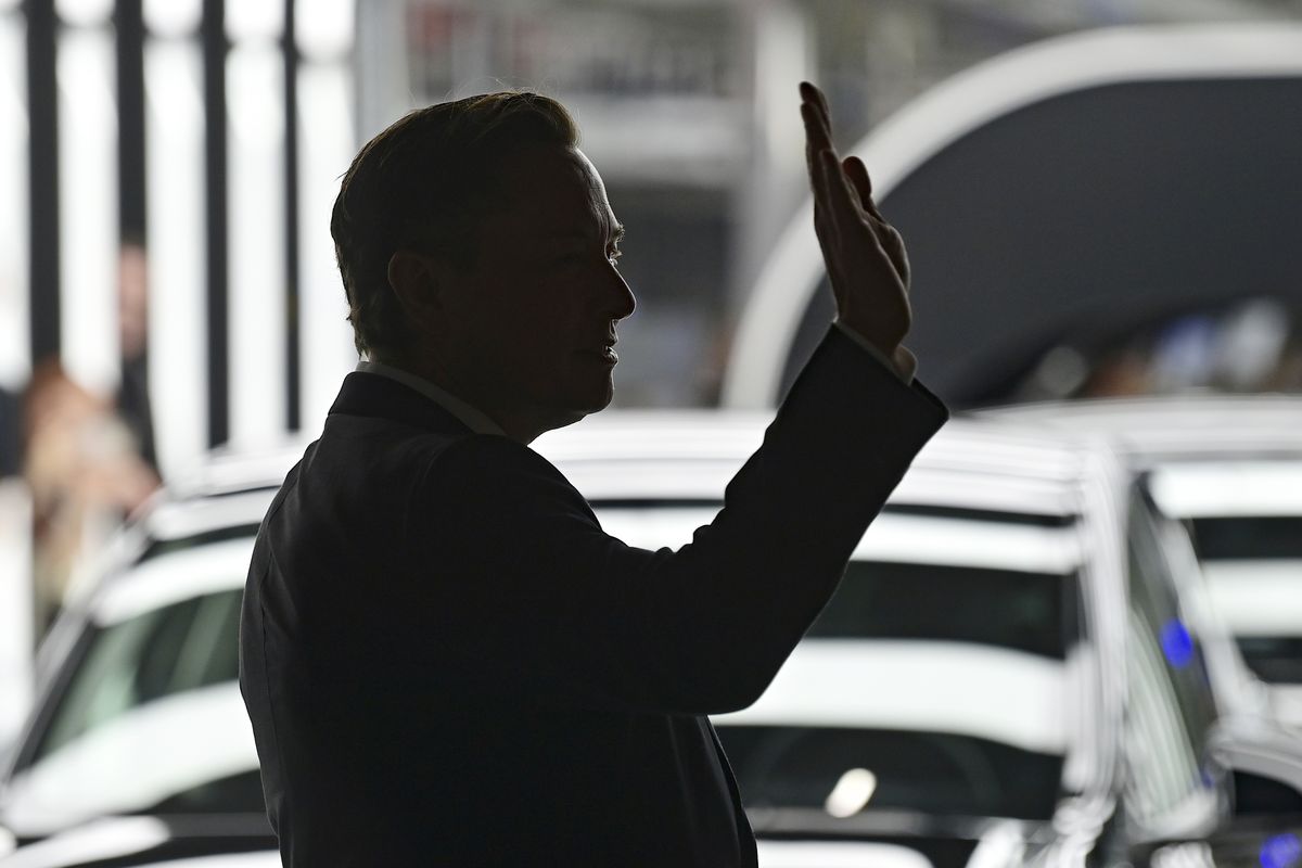 FILE - Elon Musk, Tesla CEO, attends the opening of the Tesla factory Berlin Brandenburg in Gruenheide, Germany, Tuesday, March 22, 2022. Many people are puzzled on what a Elon Musk takeover of Twitter would mean for the company and even whether he’ll go through with the deal.  If the 50-year-old Musk’s gambit has made anything clear it’s that he thrives on contradiction.  (Patrick Pleul)