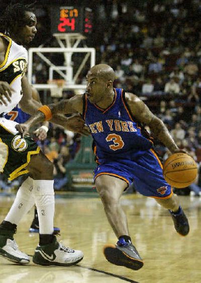 Stephon Marbury, who scored 28 points, drives past Seattle's Chris Wilcox.
(Associated Press / The Spokesman-Review)