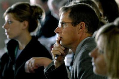 
School board member Dave Paul, center, attends the Post Falls School District budget workshop last Thursday. 
 (Kathy Plonka / The Spokesman-Review)