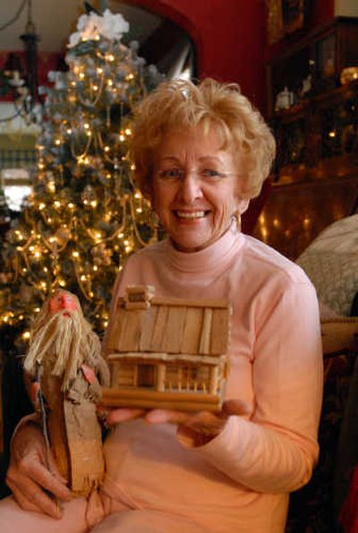 
At her home, Spokane resident Pat Carlin displays two special gifts made by her daughter and son-in-law one Christmas many years ago. 
 (Jesse Tinsley / The Spokesman-Review)