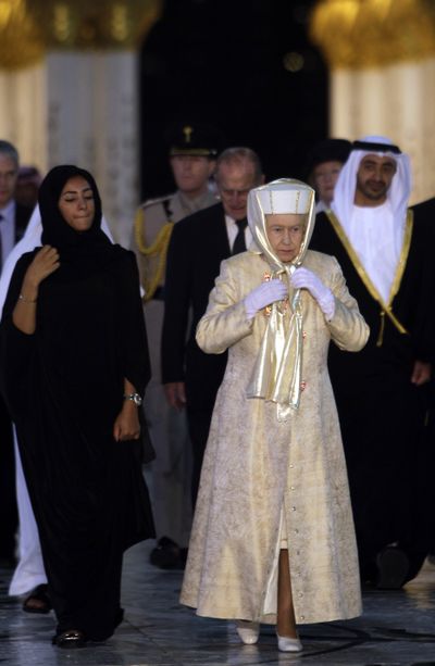 Britain’s Queen Elizabeth II arrives at the Sheik Zayed Grand Mosque during an official visit in Abu Dhabi, United Arab Emirates, on Wednesday. (Associated Press)