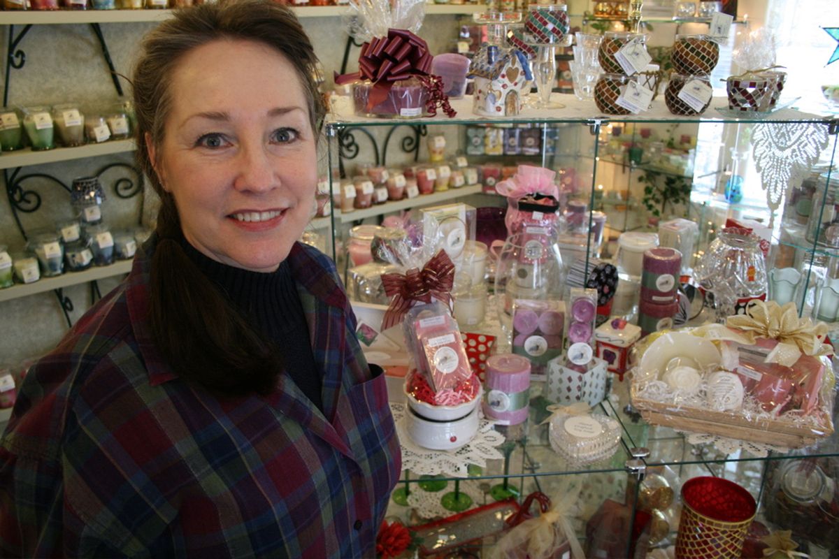 Pam Welch, owner of Blue Heron Soy Candles, says soy-based candles burn longer and hold scents better than traditional paraffin based ones.  (Megan Cooley / Down to Earth NW Correspondent)