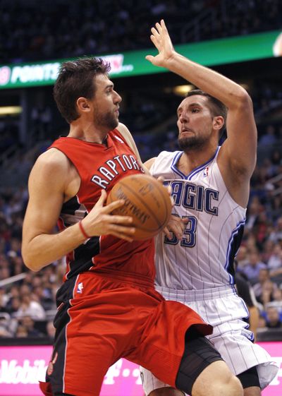 Magic forward Ryan Anderson, right, scored 24 points as Orlando stifled the Raptors in the fourth quarter for a 102-96 comeback win. (Associated Press)