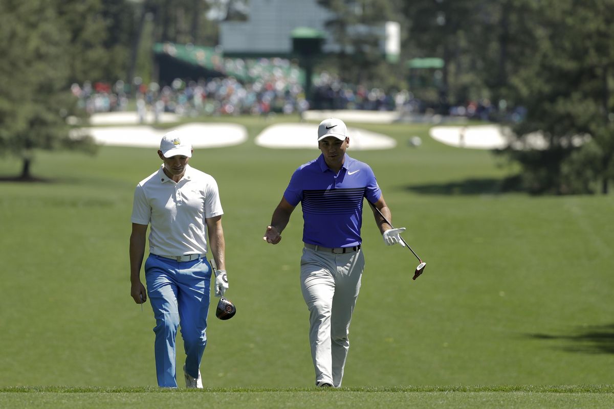 Scott Gregory, of England, left, and Jason Day, of Australia, chat on the seventh fairway during a practice round for the Masters golf tournament Tuesday, April 4, 2017, in Augusta, Ga. (Matt Slocum / Associated Press)