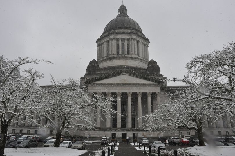 OLYMPIA -- Snow falling at the Capitol Campus last week. (Jim Camden/The Spokesman-Review)