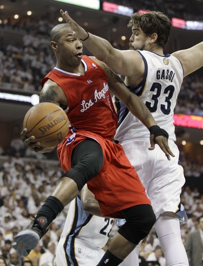 Clippers forward Caron Butler, left, drives against Memphis Grizzlies center Marc Gasol in Game 7 of first-round playoff series. (Associated Press)