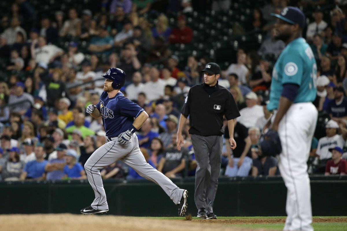 Rays’ Logan Forsythe, left, rounds the bases after hitting a homer off Fernando Rodney in the ninth inning. Rodney has allowed a run in nine of his last 13 appearances. (Associated Press)