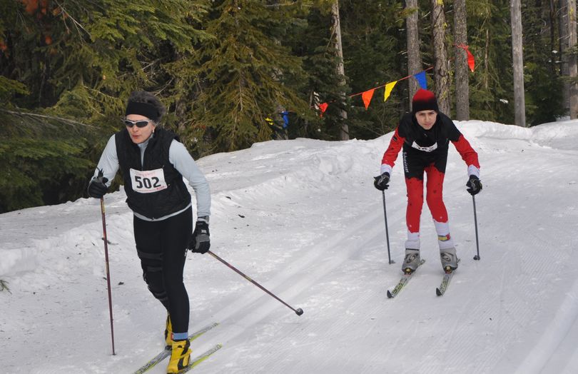Nordic skiers race to the Junction 5 area of the 10K Langlauf cross-country course at Mount Spokane on Feb. 13, 2011. (Rich Landers)