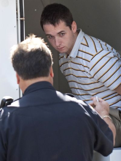 Raymond Clark III, 24, is led into court Thursday.  (Associated Press / The Spokesman-Review)