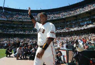 
Barry Bonds waves to fans on Tuesday, when he received his seventh N.L. MVP award. 
 (Associated Press / The Spokesman-Review)