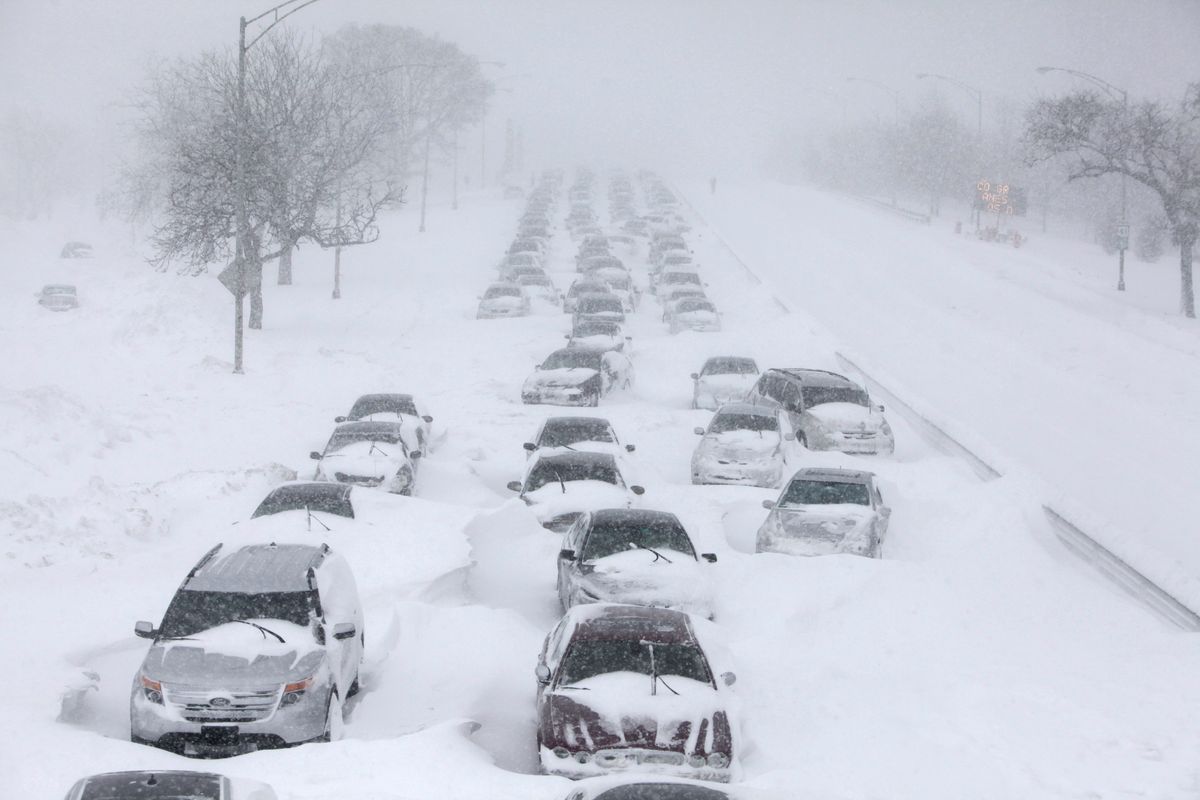 Hundreds of cars are seen stranded on lake Shore drive Wednesday, Feb. 2, 2011 in Chicago. A winter blizzard of historic proportions wobbled an otherwise snow-tough Chicago, stranding hundreds of drivers for up to 12 hours overnight on the city