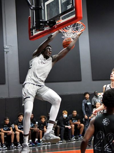 Washington State commit Mouhamed Gueye dunks during a Prolific Prep game. Gueye is the highest-rated recruit in program history. (Rick Manahan/Prolific Prep)