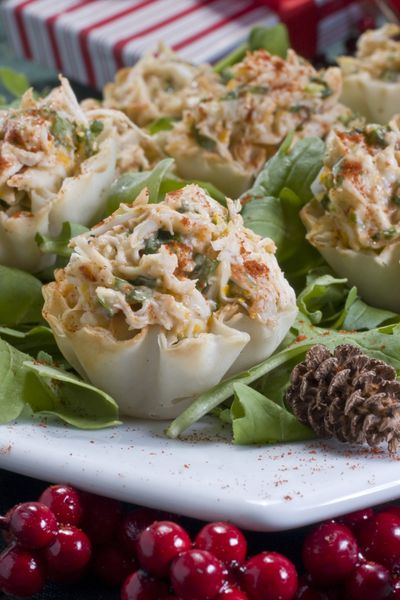 Purchased phyllo cups help make these impressive crab salad bites an easy-to- make hors d'oeuvre for your next holiday party.  (Associated Press)