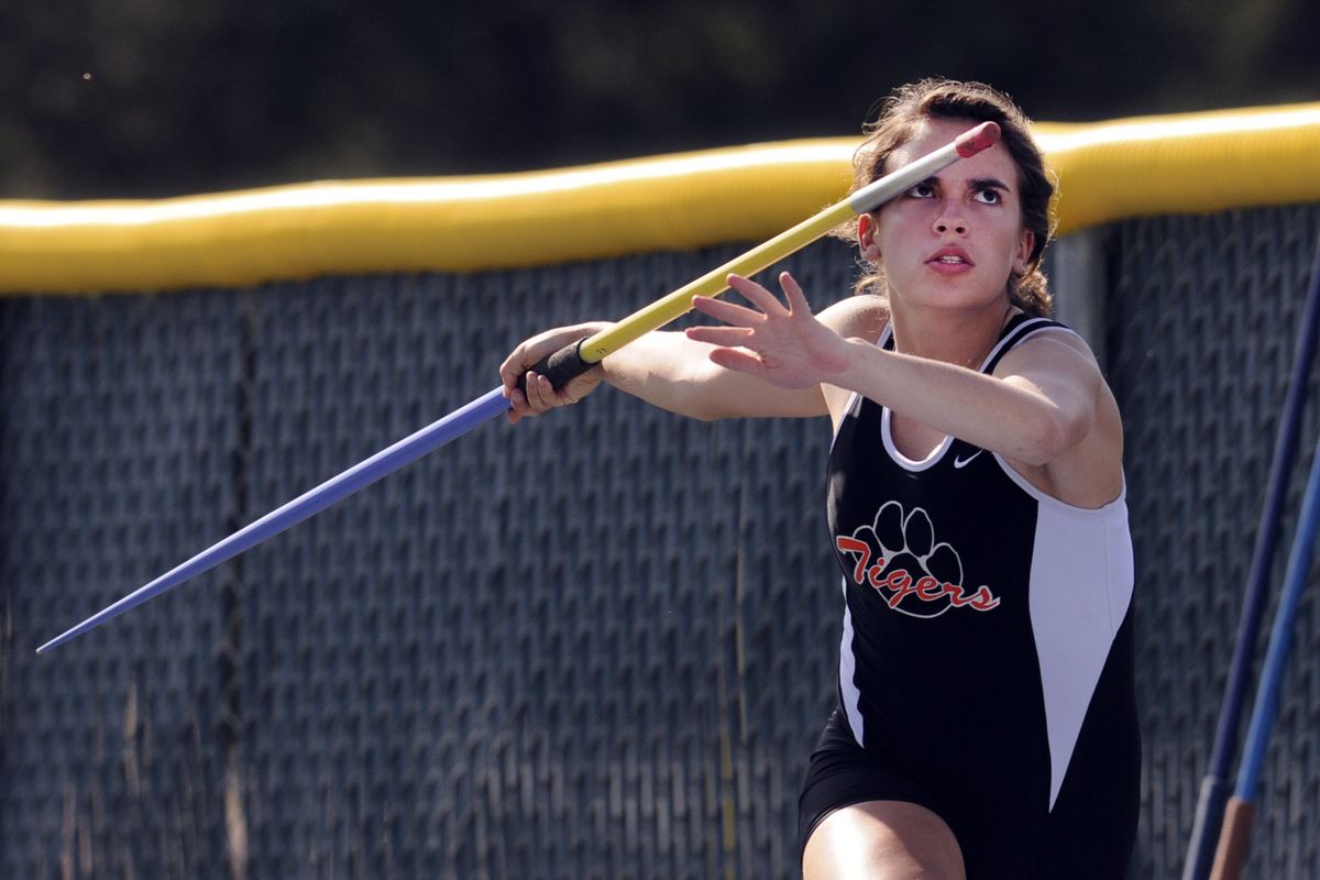 Lewis and Clark’s Caity Cunningham prepares to throw during her winning 4A javelin performance. (Jesse Tinsley)