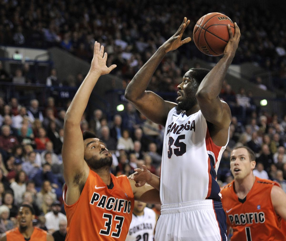 Gonzaga’s Sam Dower launches a shot over Pacific’s Tony Gill in the second half. (Dan Pelle)