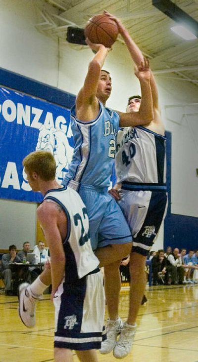 
CV junior Nick Ambrose has a shot blocked during a game against Gonzaga Prep Jan. 31. Ambrose is CV's tallest player but is undersized compared to some GSL posts.  
 (Christopher Anderson / The Spokesman-Review)