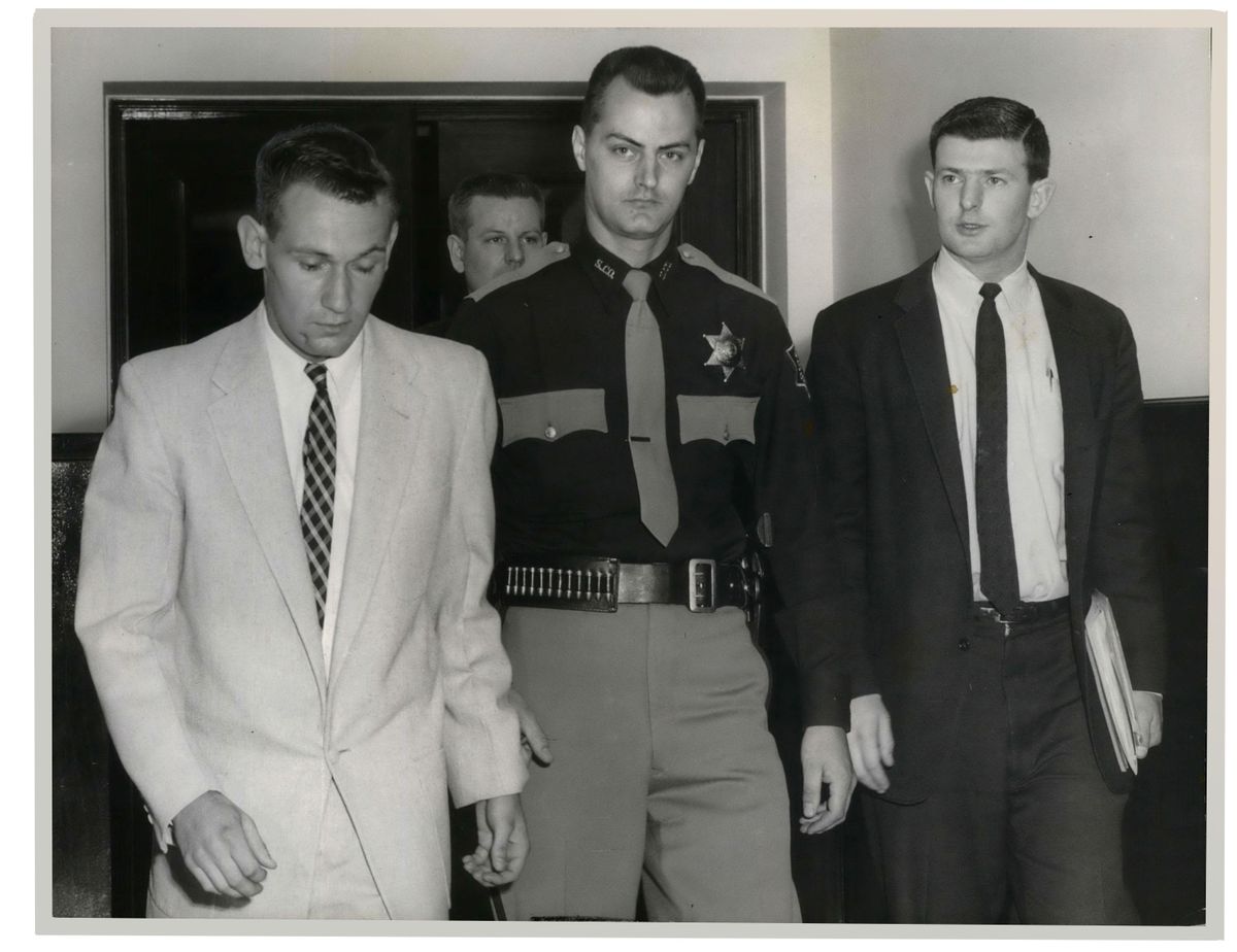 Spokane County Sheriff’s Deputy Duke Pierson walks in the courthouse in 1960. Pierson, who died last week in Alabama, is suspected in the cold case murders of three women in the summer of 1967. (Spokesman-Review archive photo)