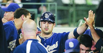 
Adrian Gonzalez scored one of San Diego's two runs.
 (Associated Press / The Spokesman-Review)