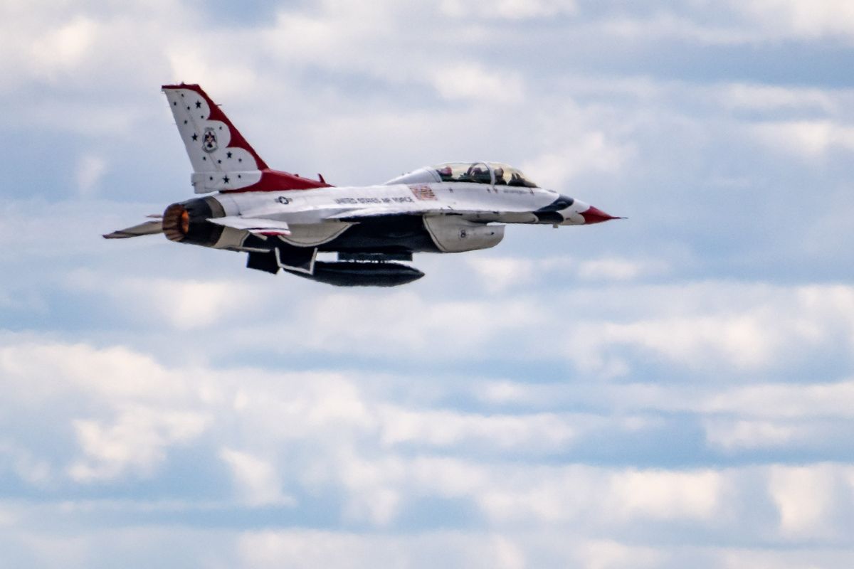 U.S. Air Force Thunderbirds pilot Maj. Jacob Impellizzeri takes Airway Height Police officer Patrick Carbaugh for a flight in a F-16 fighter jet, Friday. May 13, 2022, at Fairchild Air Force Base. The jet took off fast and went straight up into the cloud deck hitting g-force of 9.  (COLIN MULVANY/THE SPOKESMAN-REVI)