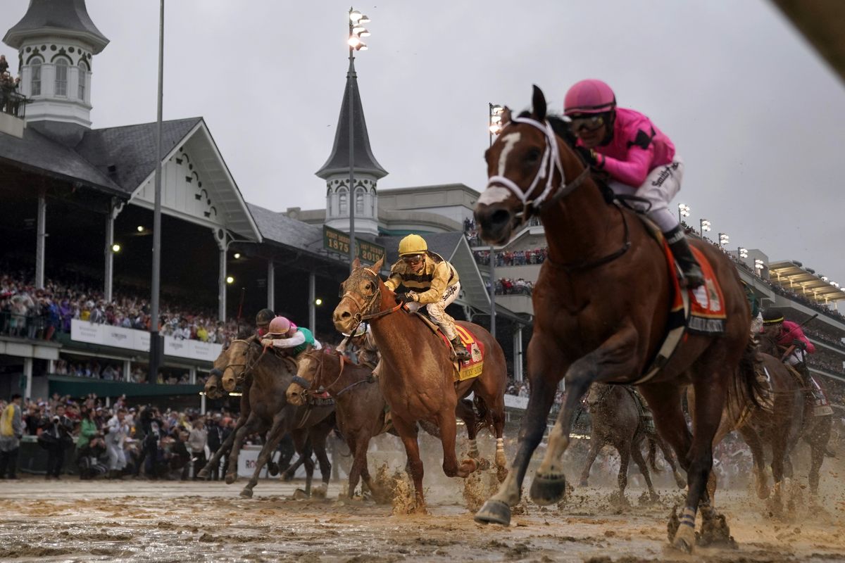 Jockey Flavien Prat, aboard Country House, center, was declared the winner of last year’s Kentucky Derby after Maximum Security, ridden by Luis Saez, right, was disqualified by Churchill Downs stewards for interference, an unprecedented move at the Triple Crown race.  (Matt Slocum)