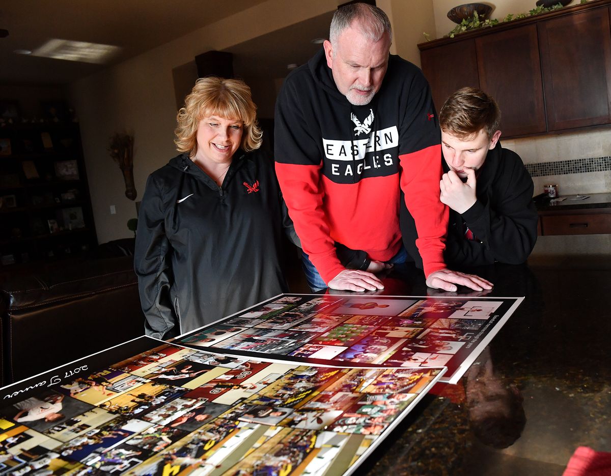 Tara and Randy Groves parents of EWU stars and brothers Jacob and Tanner Groves check out photos of their son