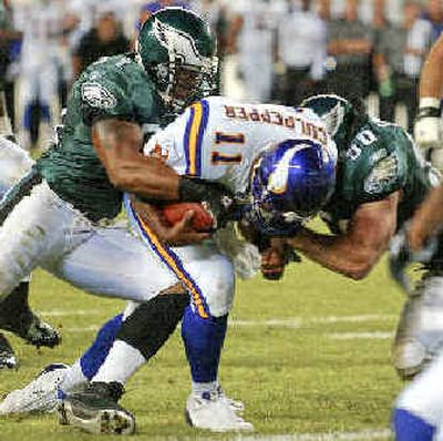 
Minnesota quarterback Daunte Culpepper (11) is stripped of the ball at the goal line late in the second quarter. 
 (Associated Press / The Spokesman-Review)