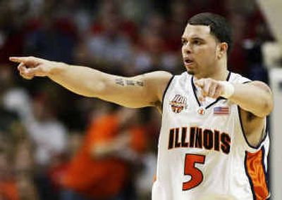 
Deron Williams directs his Illinois teammates during the second half of Sunday's Big Ten tournament championship game against Wisconsin. 
 (Associated Press / The Spokesman-Review)