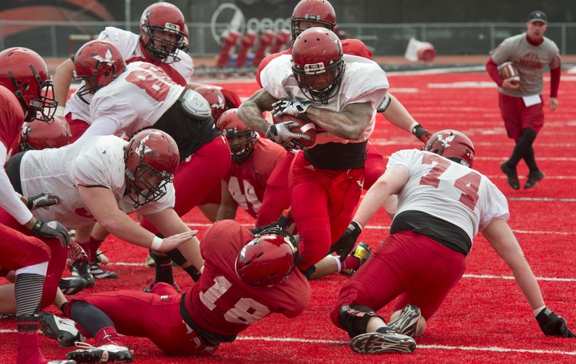 The Eagles will be counting on the versatile Quincy Forte, pounding the ball inside during Saturday’s scrimmage, to carry a big load this fall. (Dan Pelle)