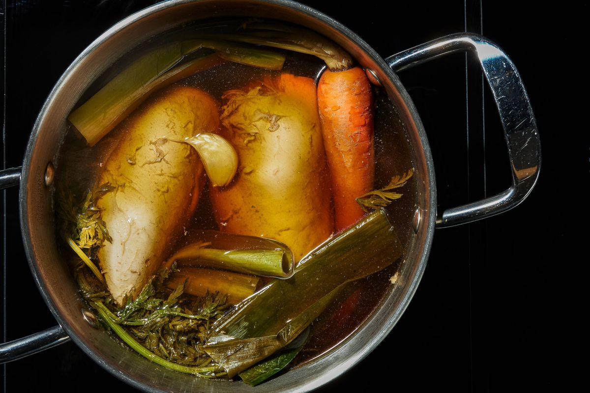 You can season the poaching liquid with your choice of herbs, spices and even vegetables.  (Rey Lopez for The Washington Post/food styling by Lisa Cherkasky for The Washington Post)