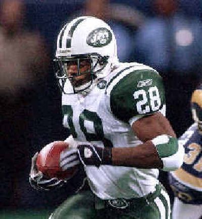 
Running back Curtis Martin and the Jets lost in St. Louis, but still earned a playoff berth.
 (Associated Press / The Spokesman-Review)