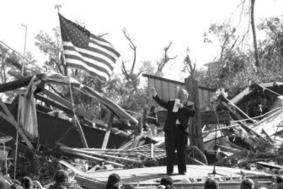 
The Rev. Larry Lynn, pastor of the Lady Lake Church of God, leads Sunday services in front of his destroyed church in Lady Lake, Fla.
 (Associated Press / The Spokesman-Review)