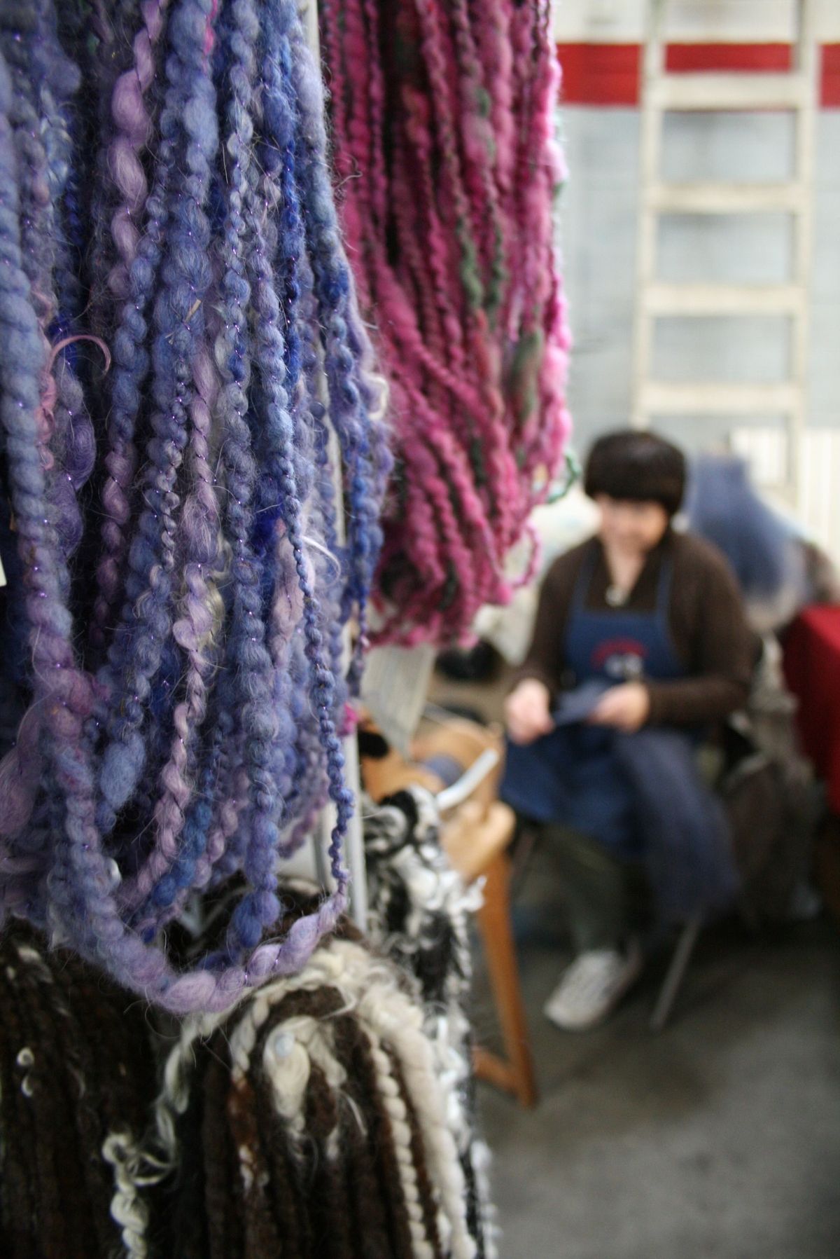 Joyce Thomas, of Thistledown Shetlands & Wools, spins yarn at the Community Roots Local Market on March 15, 2009. (Megan Cooley / The Spokesman-Review)