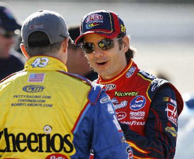 
Jeff Gordon, right, talks with Bobby Labonte before qualifying for the Auto Club 500 Friday. 
 (Associated Press / The Spokesman-Review)