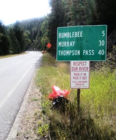 Who's to blame for all the litter along the North Fork? Shoshone County Sheriff Mitch Alexander is reluctant to point fingers. But evidence exists to show that Kootenai and Spokane county residents probably are. Here's a directional sign from the area. (Shoshone County SD courtesy photo)