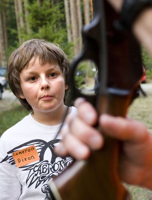 Cameron Dixon, 10, of Fall City, Wash., gets instruction in the use of a rifle from hunter education instructor Bob Cromwell during a hunter education class at the Issaquah Sportsmen’s Club in Issaquah, Wash.  (File Associated Press / The Spokesman-Review)