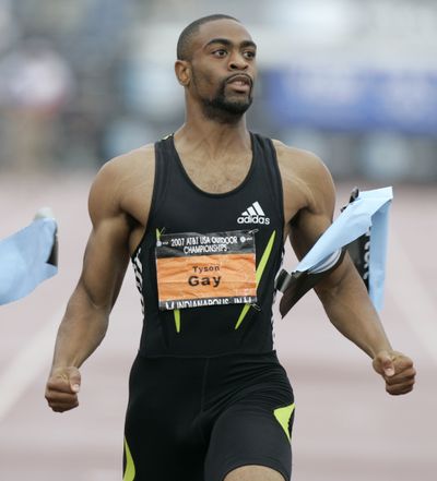 Web site made a mess of Tyson Gay’s victory on track. (Associated Press / The Spokesman-Review)