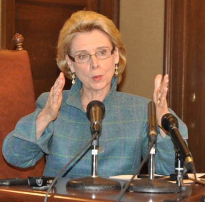 OLYMPIA -- Gov. Chris Gregoire says budget negotiators have moved closer together, but they're still about this far apart in trying to reach a deal. (Jim Camden)