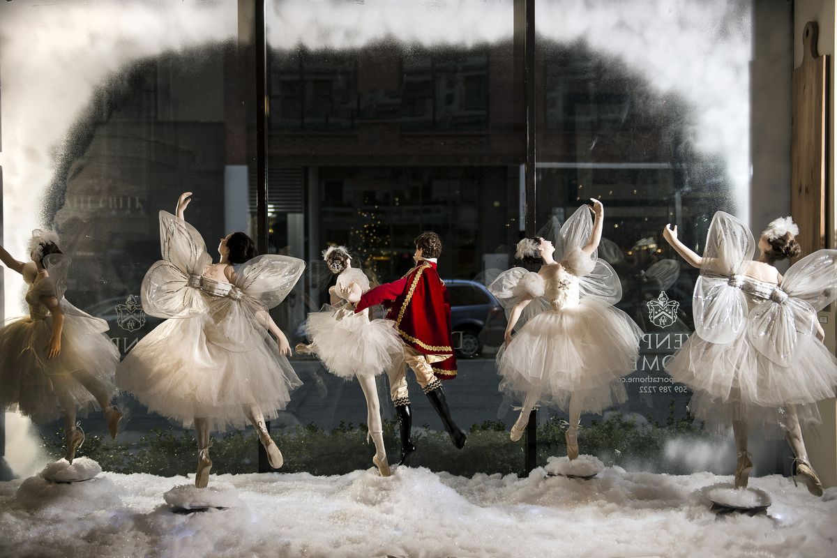 Rotationg Nutcracker Ballet figurines grace the window to the Davenport Home gift shop, Tuesday, Dec 12, 2017. The figures were used as props for a Christmas window in The Crescent department store decades ago.  (Colin Mulvany / The Spokesman-Review)