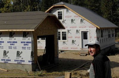 
Kent Compton talks about the new homes in Elmira, Idaho, on Wednesday.   The small, period-looking homes  are affordably priced. 
 (Kathy Plonka / The Spokesman-Review)