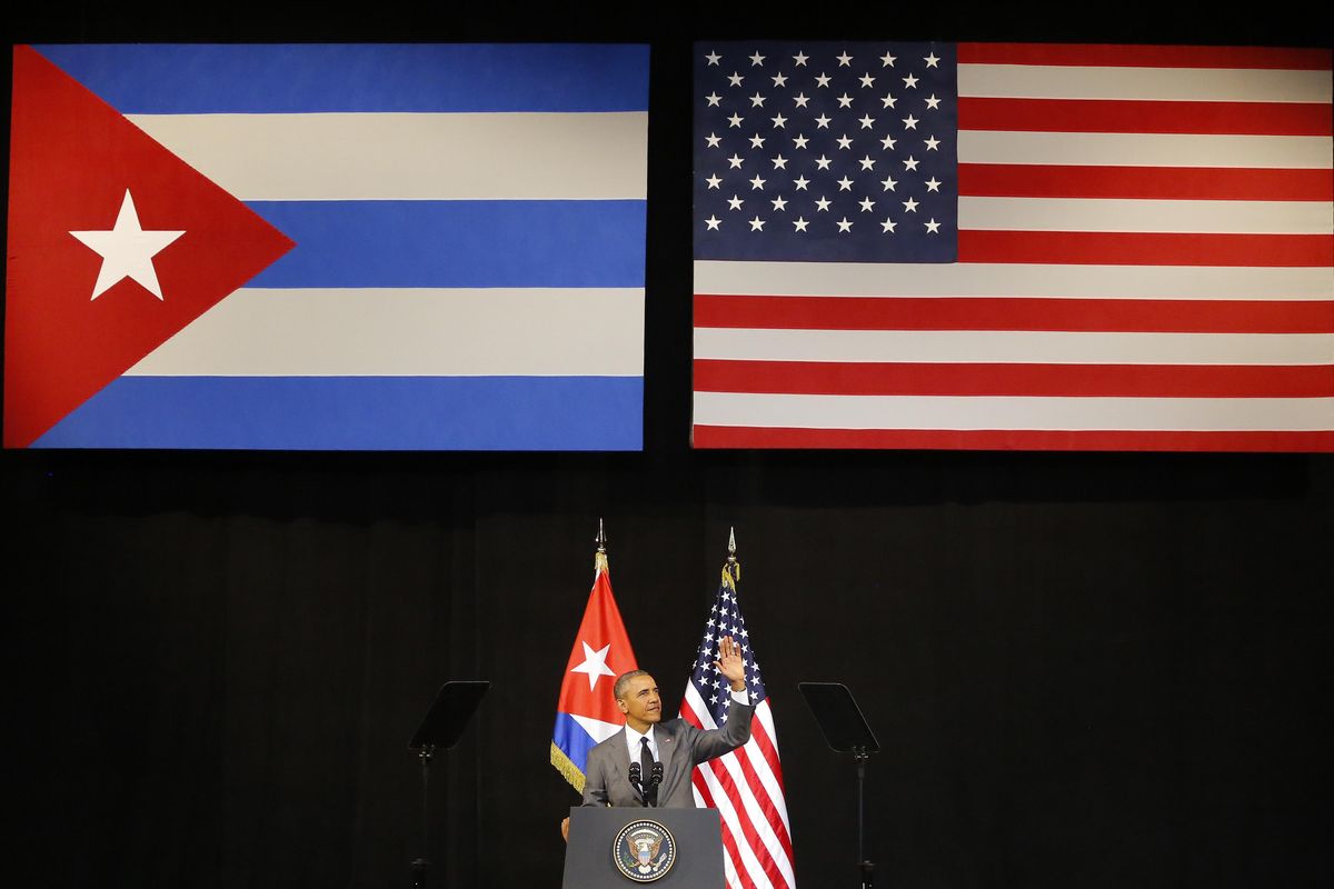 In this March 22, 2016 file photo, President Barack Obama speaks at the Grand Theater of Havana, Cuba. President Barack Obama is ending a longstanding immigration policy that allows any Cuban national who makes it to U.S. soil to stay and become a legal resident, a senior administration official said Thursday, Jan. 12, 2017. (Desmond Boylan / Associated Press)