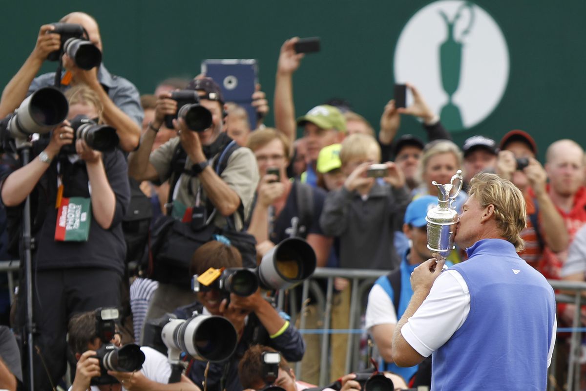 Ernie Els kisses the claret jug trophy after winning the British Open Golf Championship at Royal Lytham & St. Annes on Sunday. (Associated Press)